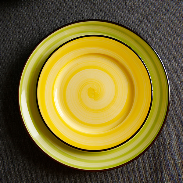 Colorful ceramic disc with black edge