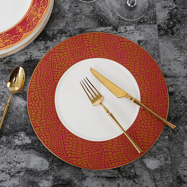 Red and gold crocodile print display plate