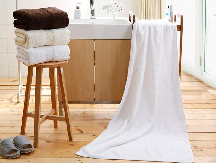 What are the tips for making hotel towels white and soft?